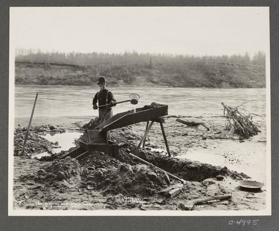 North Sask Heritage River – Man washing gold at Edmonton, 1890. LAC e011303100-040.